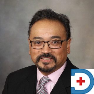 Dr. Norman E. Torres