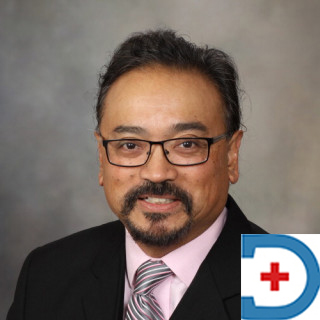 Dr. Norman E. Torres