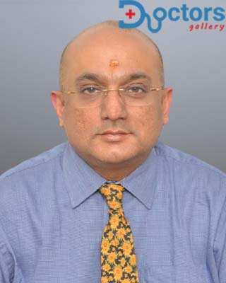 Dr Krishna G Seshadri